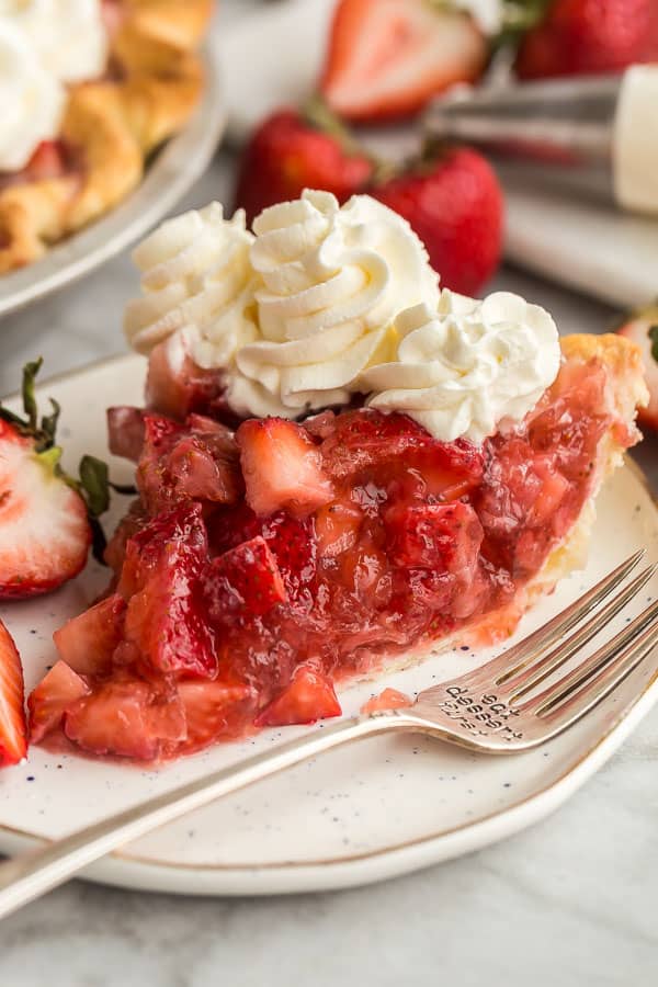 slice of strawberry pie on white plate