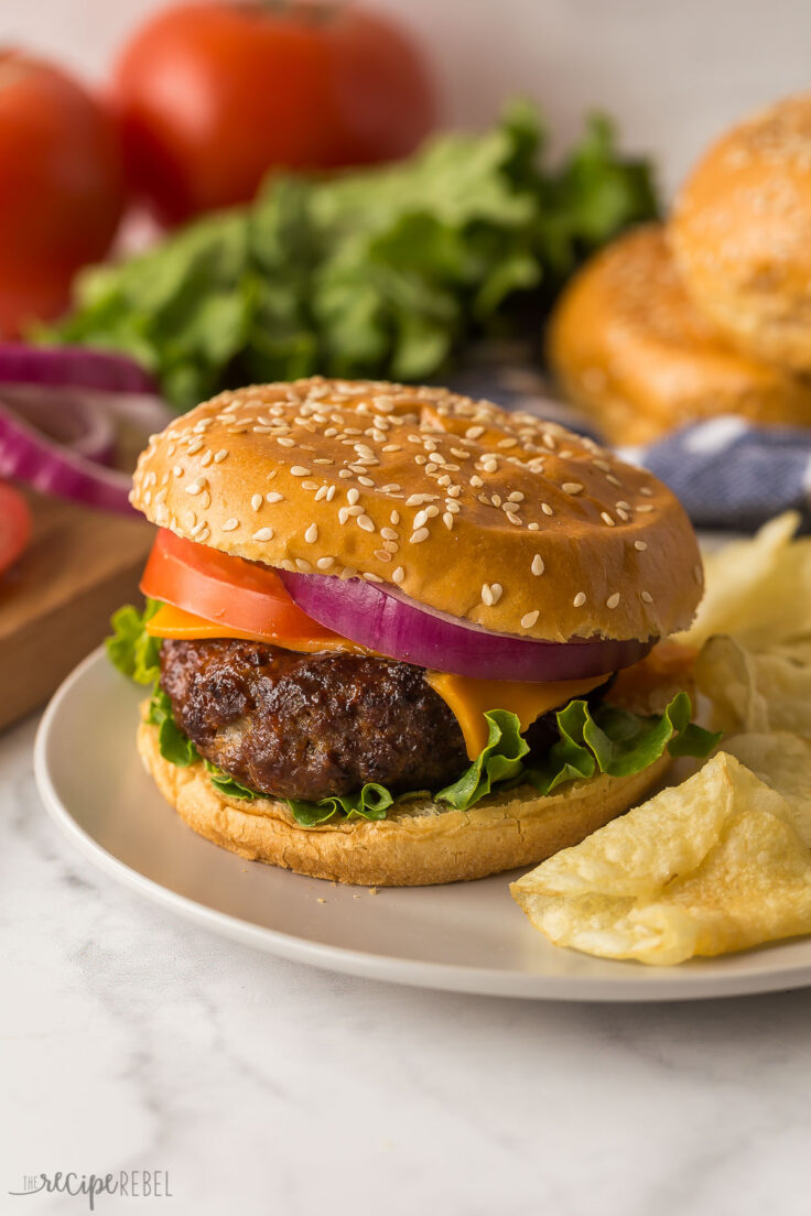 air fryer burger in bun with chips on the side