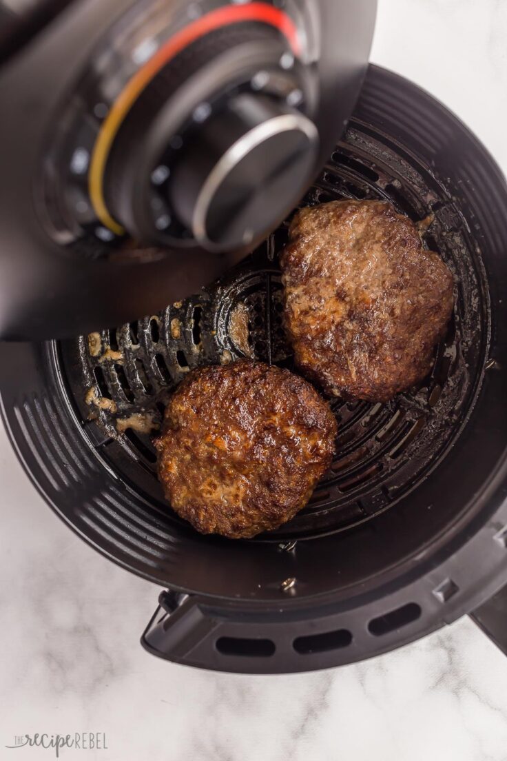 cooked burgers coming out of air fryer