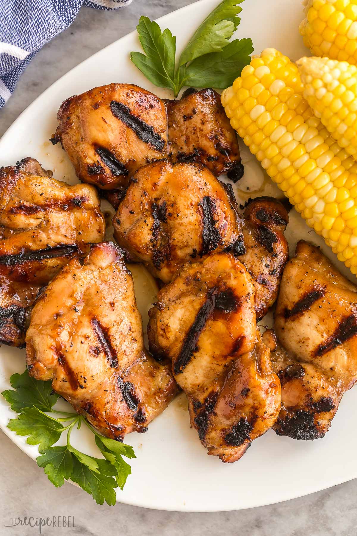 close up image of boneless chicken thighs on white plate