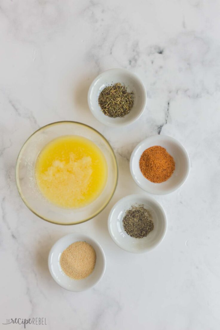 melted butter and seasonings in individual bowls