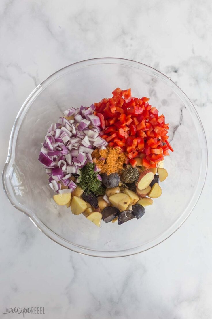 foil pack vegetables and seasonings stirred together