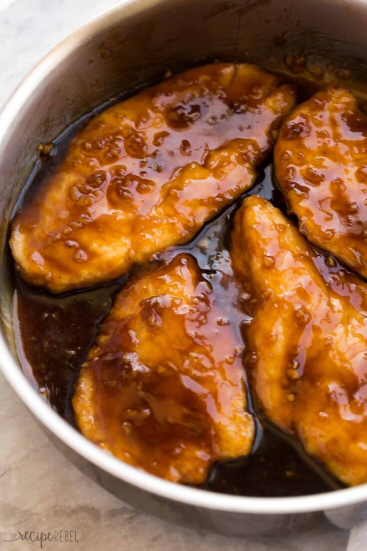 close up image of honey garlic chicken in pan