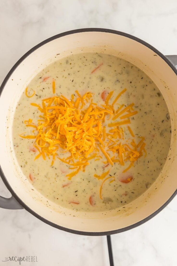 thickened milk and cheddar cheese added to potato soup