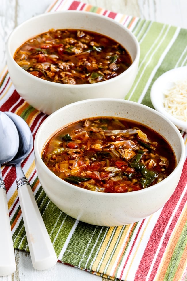 two bowls of cabbage soup with ground beef