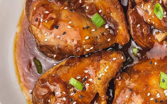 slow cooker honey garlic chicken breasts in bowl