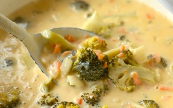 close up image of bowl of broccoli cheese soup