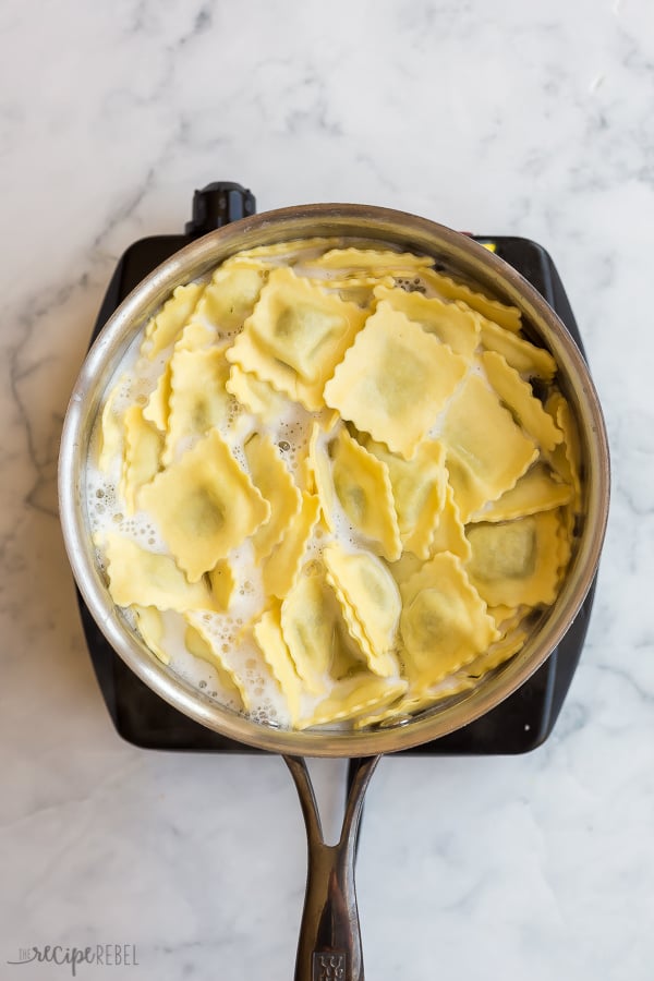 ravioli cooking in boiling salted water