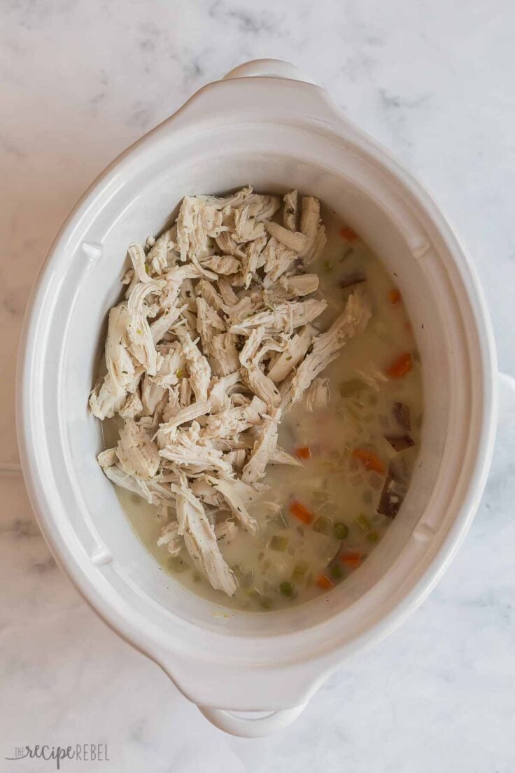 shredded chicken and cream added to crockpot chicken and dumplings