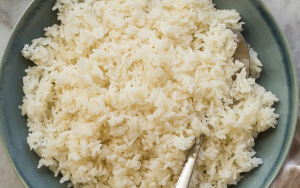 square image of instant pot jasmine rice in blue bowl
