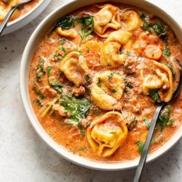 overhead image of bowl of slow cooker tortellini soup