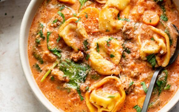overhead image of bowl of slow cooker tortellini soup