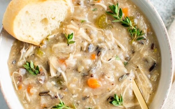 overhead image of slow cooker wild rice soup in bowl