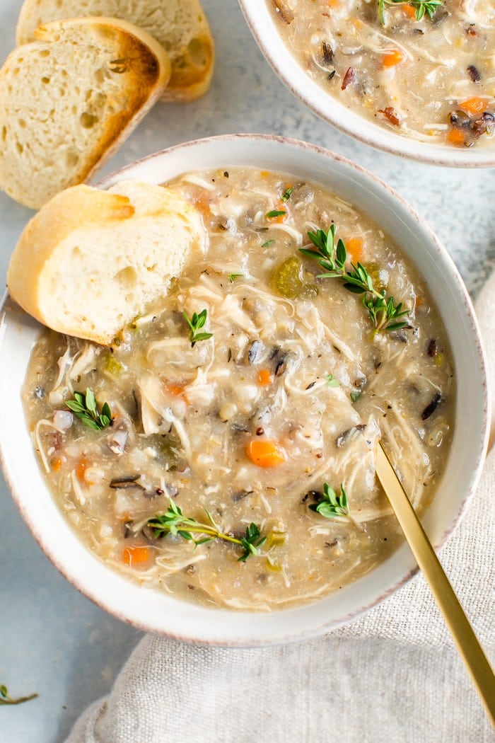 overhead image of slow cooker wild rice soup in bowl