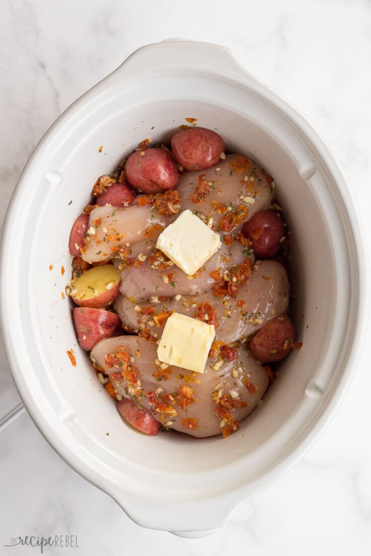 butter on top of chicken breasts in slow cooker