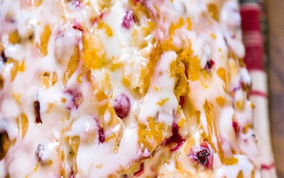 cranberry orange bread with glaze on top