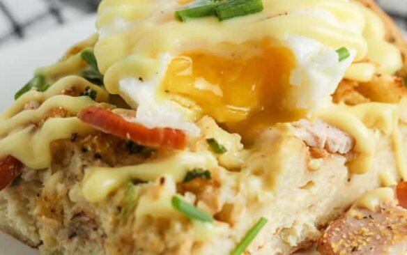 eggs benedict breakfast casserole with hollandaise on top