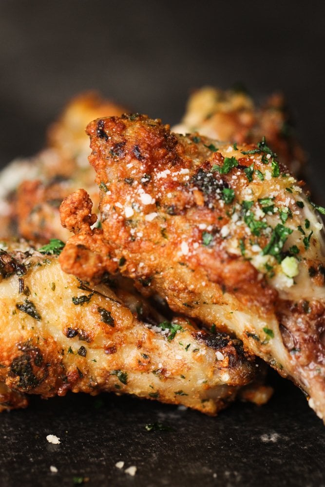 close up image of air fryer garlic parmesan chicken wings