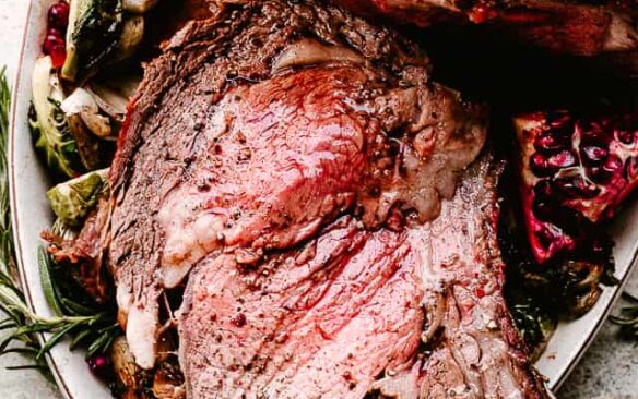 close up image of prime rib roast with red interior