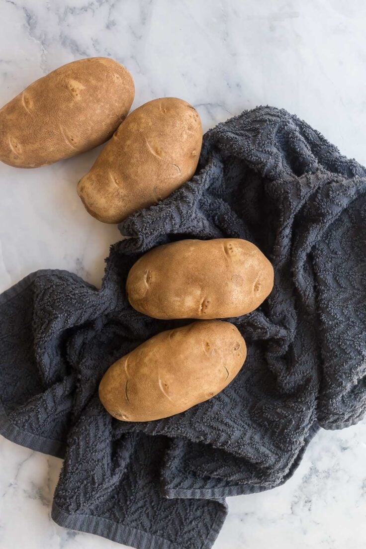 russet potatoes drying on a towel