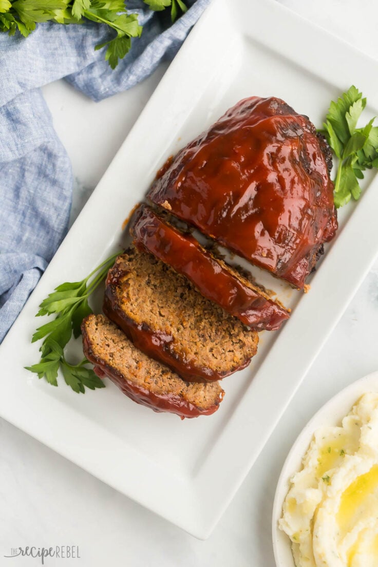 overhead image of air fryer meatloaf on white platter