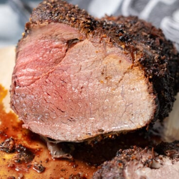 air fryer roast beef cut open to reveal slightly pink center