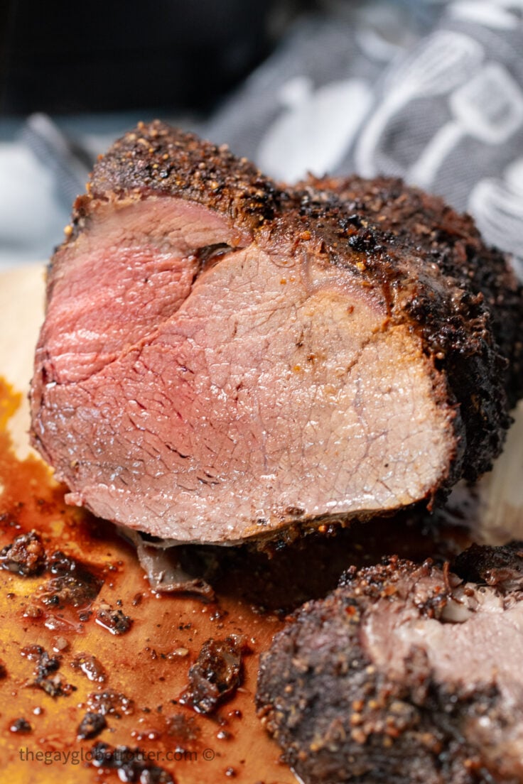 air fryer roast beef cut open to reveal slightly pink center