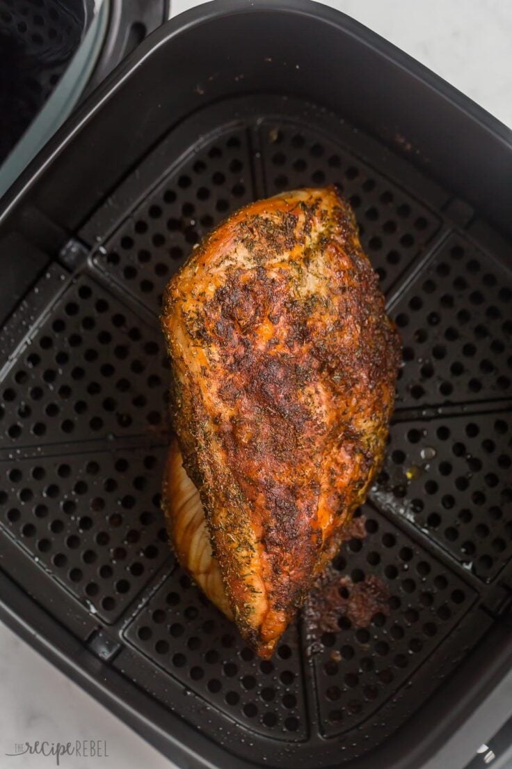 cooked air fryer turkey breast in air fryer basket