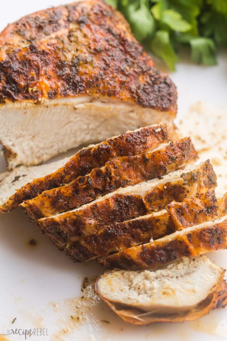 air fryer turkey breast with several slices cut