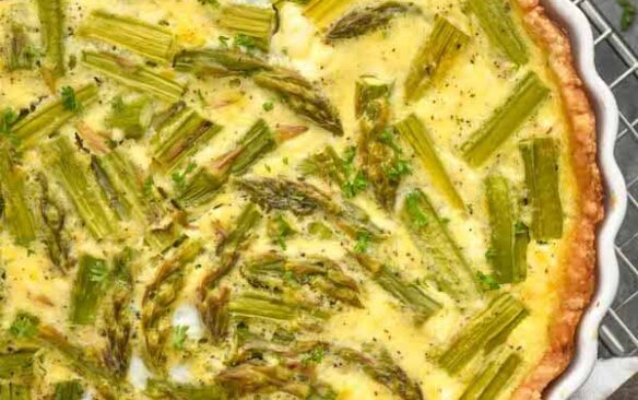 asparagus quiche overhead in white tart pan