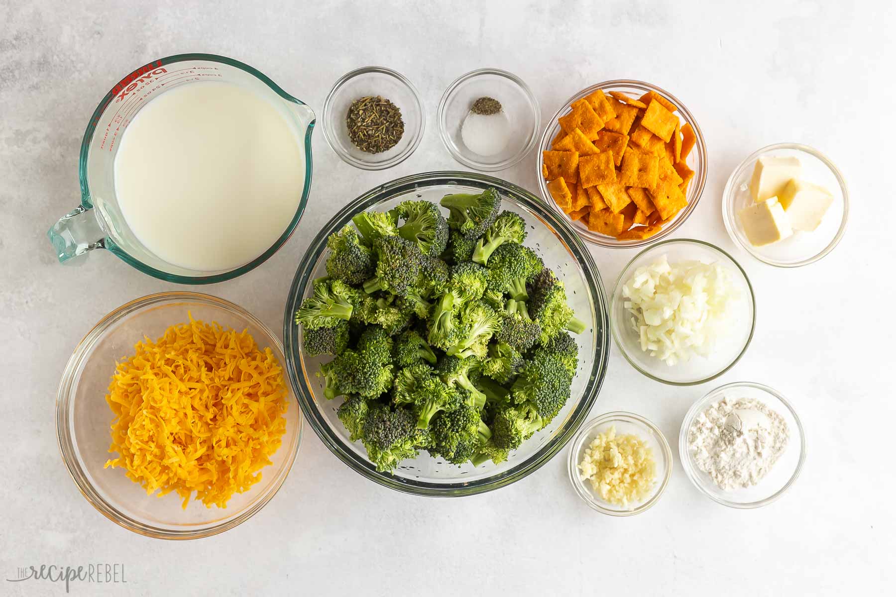 ingredients for broccoli casserole on a white background.
