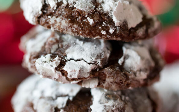 tall stack of chocolate crinkle cookies