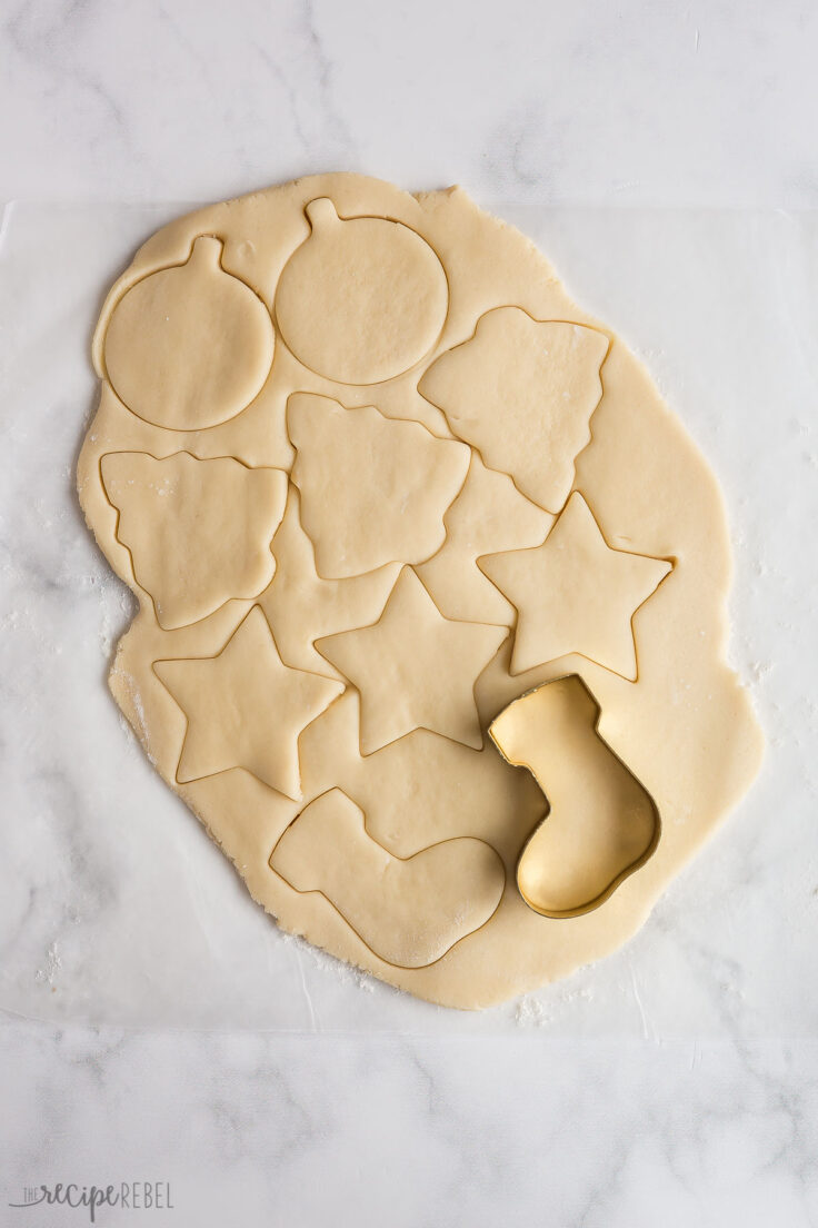 cookie cutter cutting out sugar cookie dough