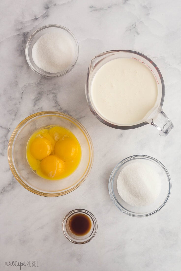 ingredients needed to make creme brulee on white background