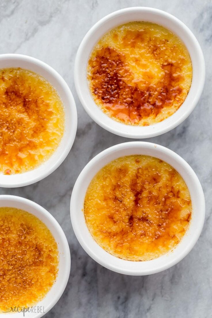 overhead image of four ramekins of creme brulee