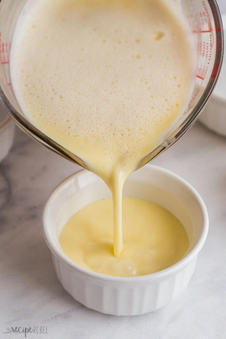 creme brulee mixture being poured into ramekins