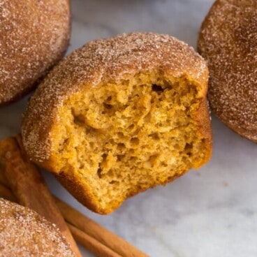 square image of pumpkin muffins with a cinnamon sugar topping