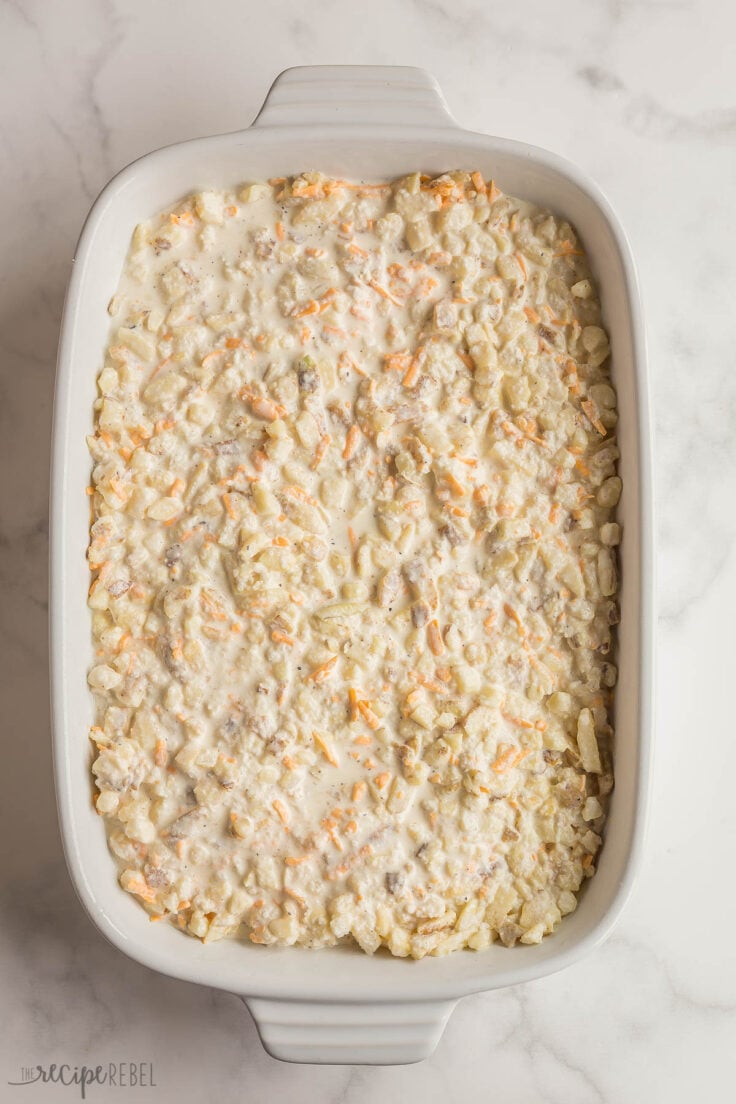 hashbrown casserole in pan ready for topping