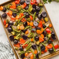 overhead image of roasted vegetables on sheet pan