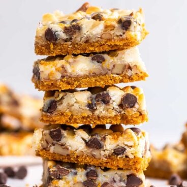 stack of five magic bars with chocolate chips around.