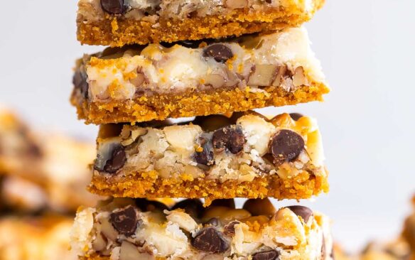 stack of five magic bars with chocolate chips around.