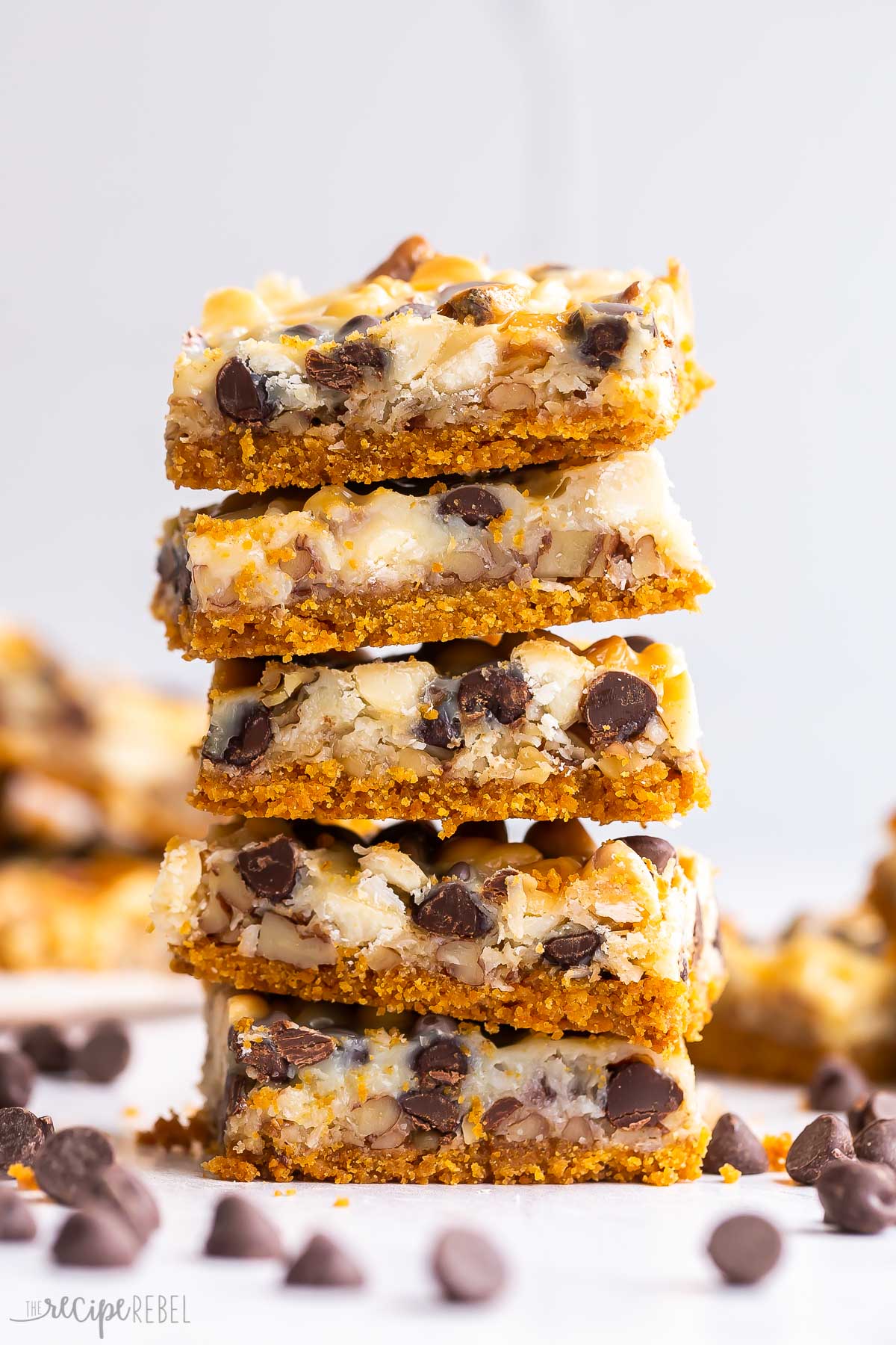 stack of five magic bars with chocolate chips around.