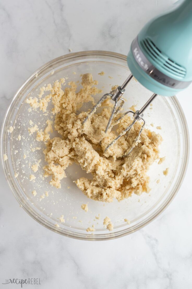 butter and sugars beat in glass bowl with mixer