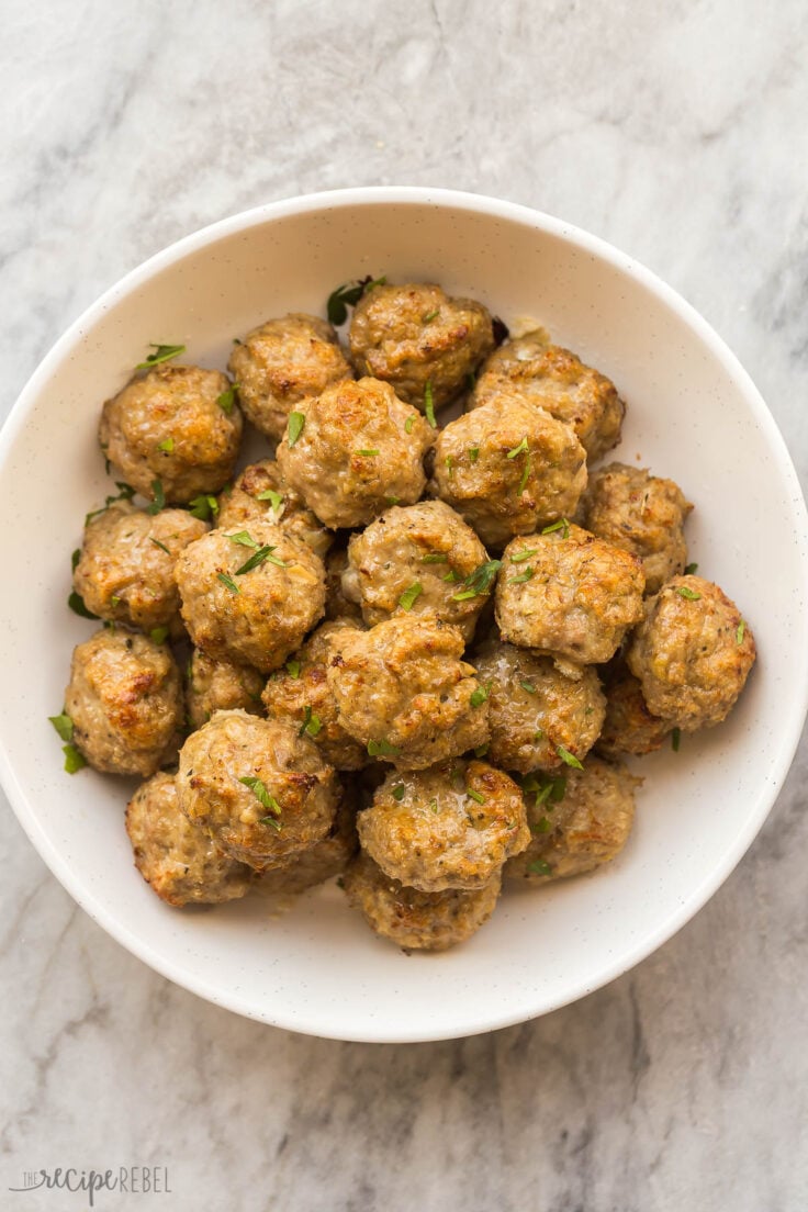 overhead image of baked turkey meatballs in bowl