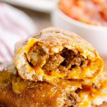 air fryer taco calzone cut in half to reveal filling