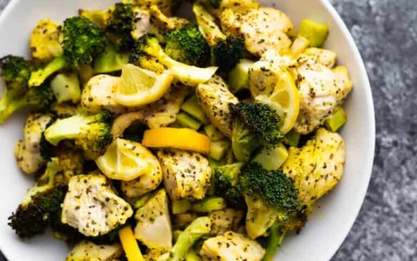 Lemon pepper chicken and broccoli on a plate.