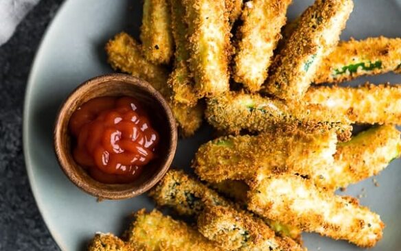 overhead image of air fryer zucchini fries on plate