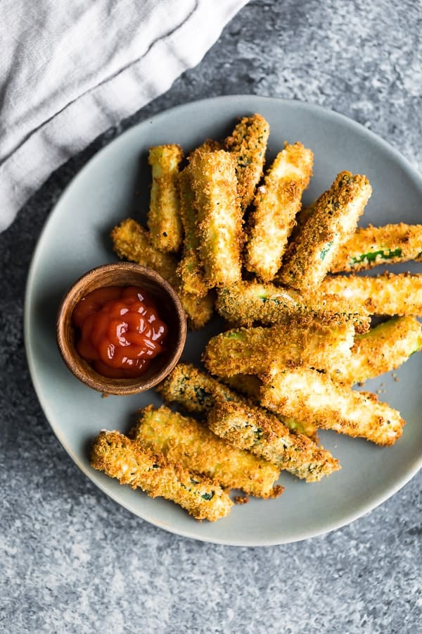 overhead image of air fryer zucchini fries on plate