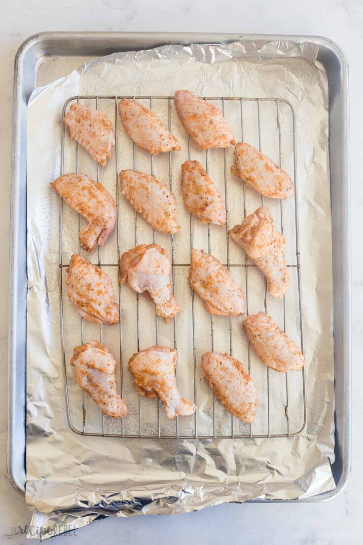 uncooked chicken wings on baking rack ready to cook