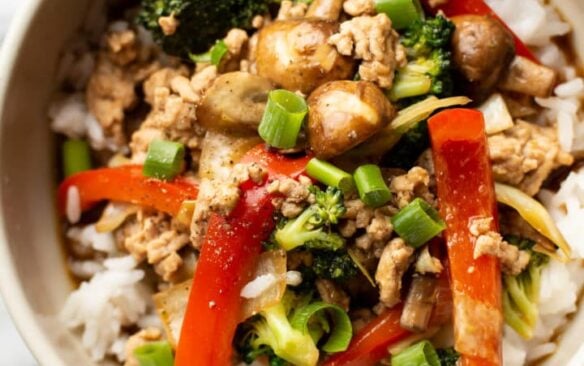 Ground turkey stir fry served over rice.